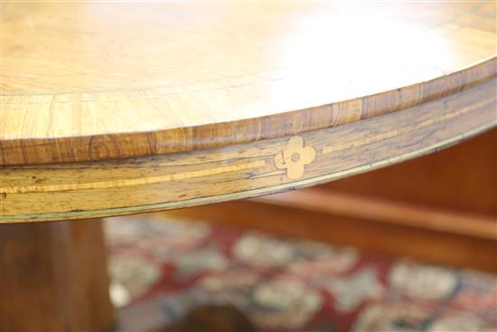 A Regency brass strung rosewood breakfast table, Diam.3ft 10in. H.2ft 6in.